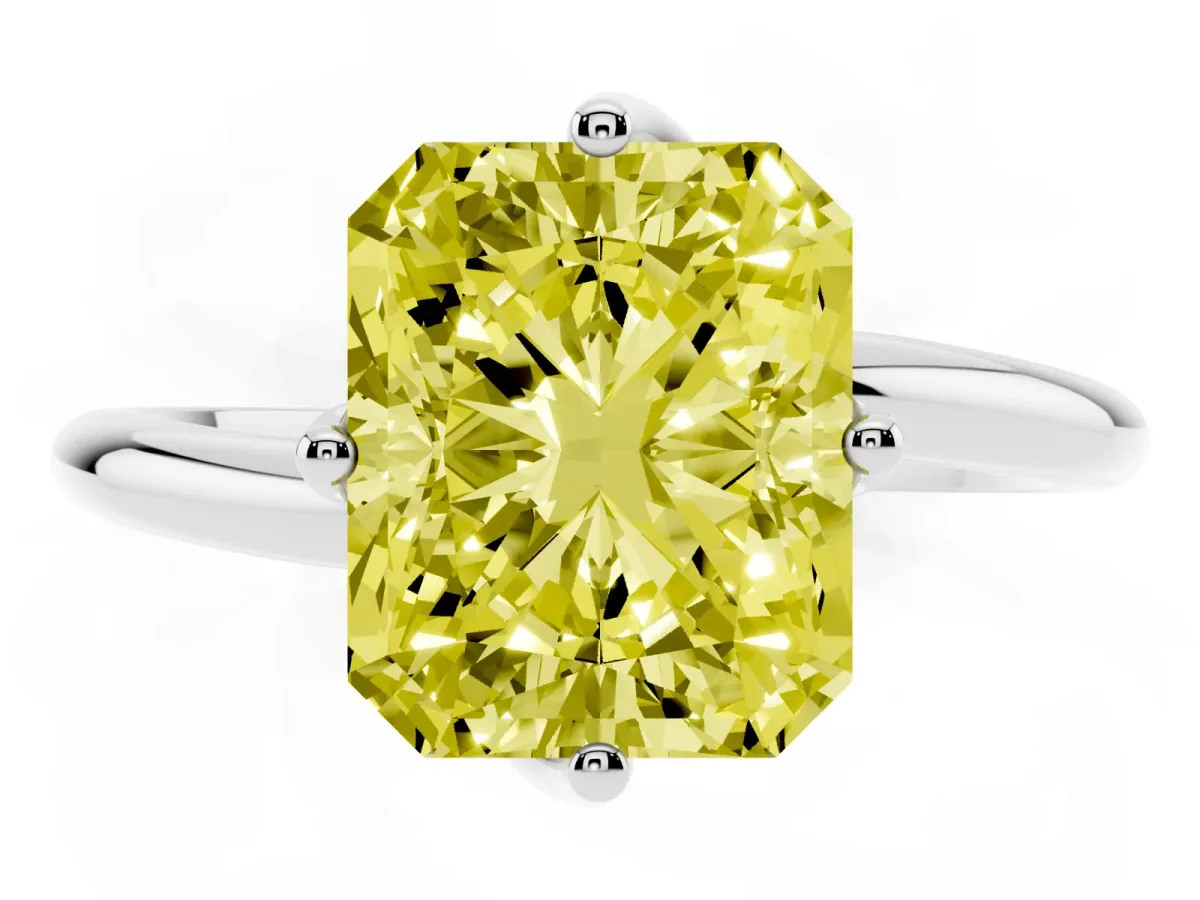 Fancy Yellow Radiant Cut Diamond Solitaire Engagement Ring with Four-Prong Setting and Classic Band Silver