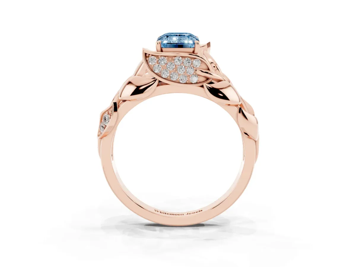 Fancy Blue Emerald Cut Diamond Leaf-Inspired Engagement Ring with Round Accents and Prong Setting Rose gold