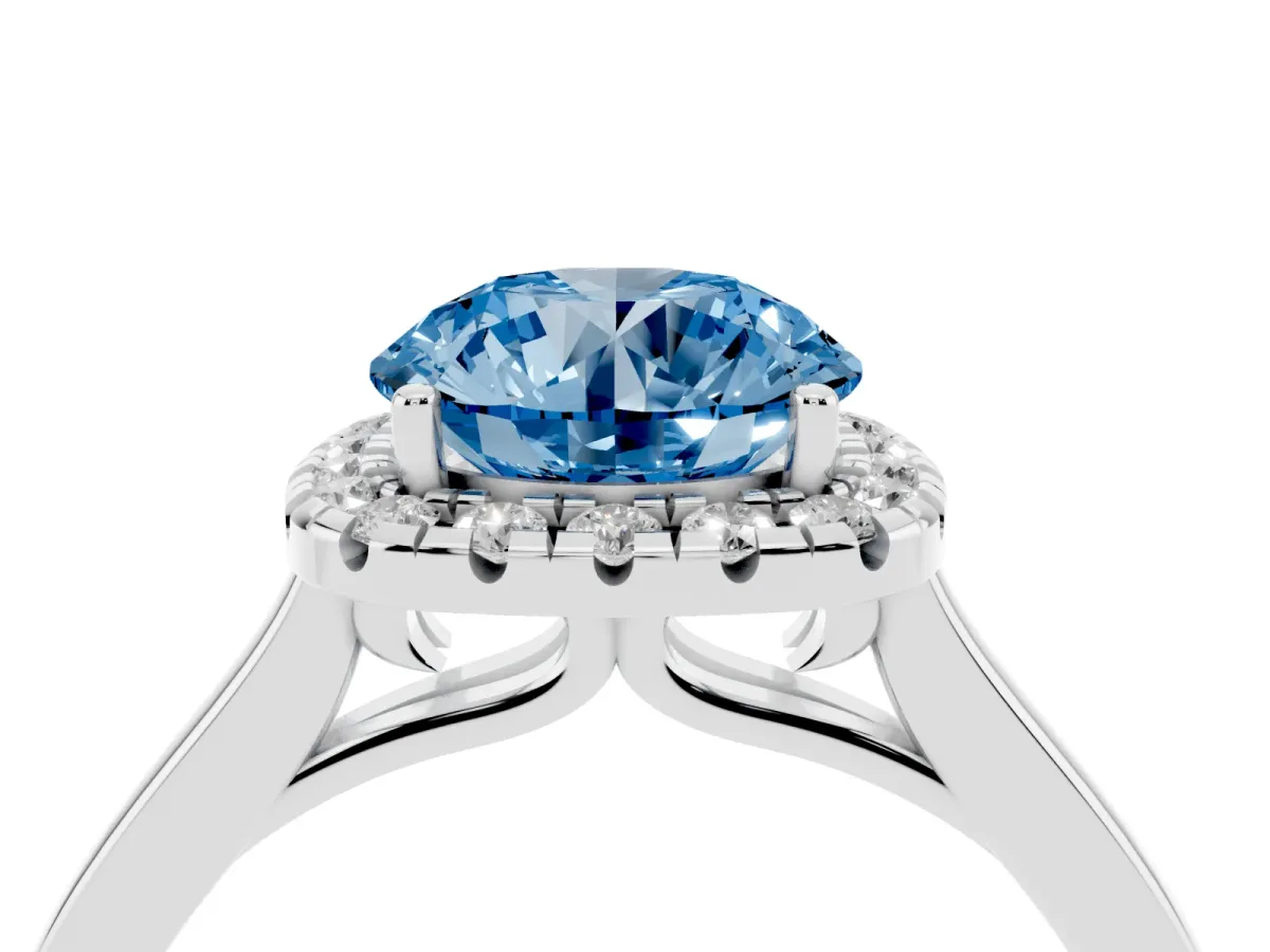 Fancy Blue Round Cut Halo Round Diamond Solitaire Ring with Pavé Band and Four-Prong Setting Silver
