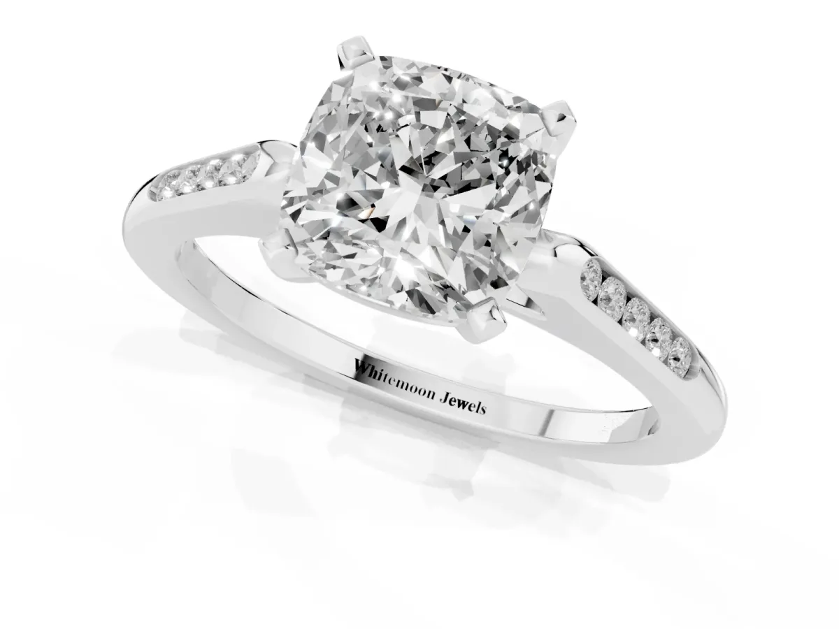 Cushion Cut Diamond Solitaire Ring with Channel Set Round Band and Prong Setting Silver
