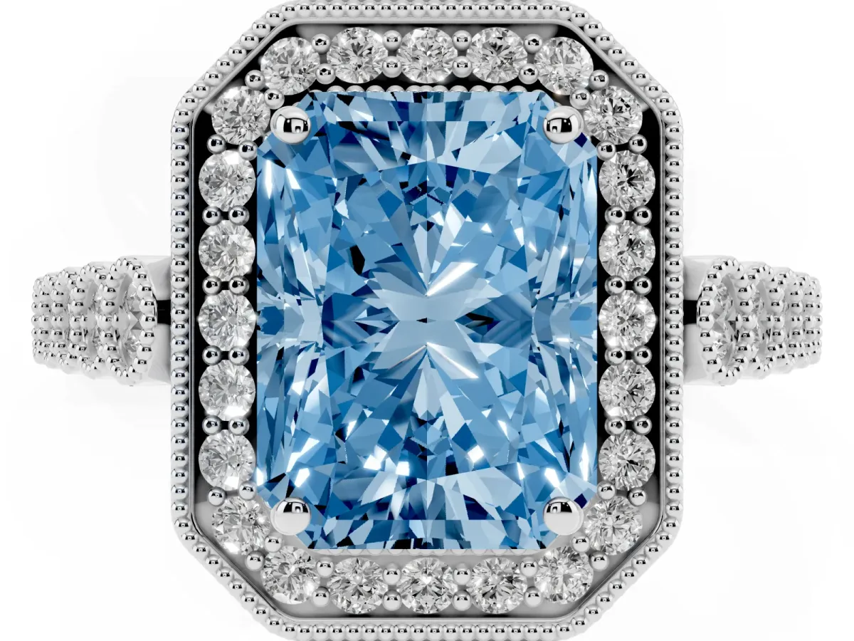 Fancy Blue Radiant Cut Halo Milgrain Solitaire with Bezel Set Side Stones and Pave Band White gold
