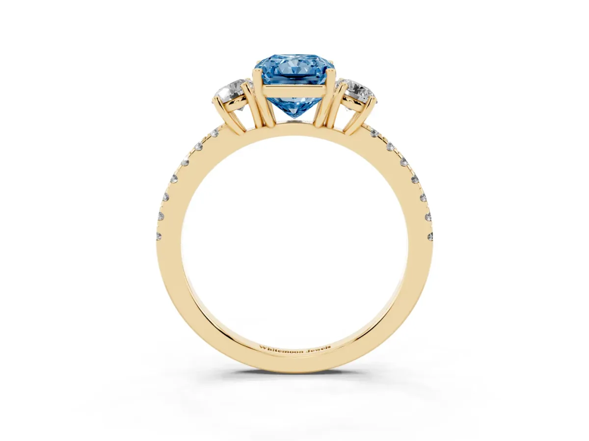 Fancy Blue Three-Stone Radiant Cut Cut Diamond Pavé Band with Prong Setting Yellow gold