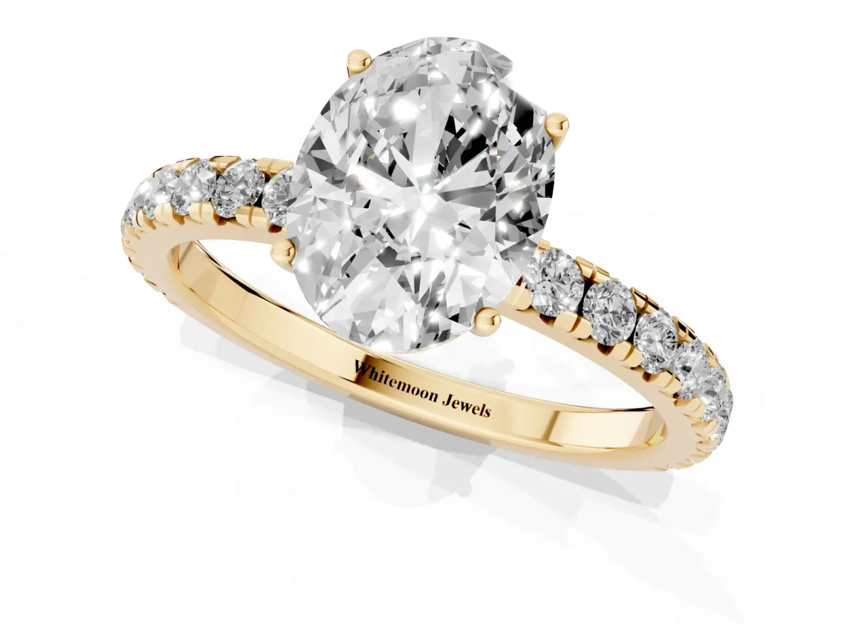 Oval Cut Diamond Pavé Solitaire Engagement Ring with Four-Prong Setting Yellow gold