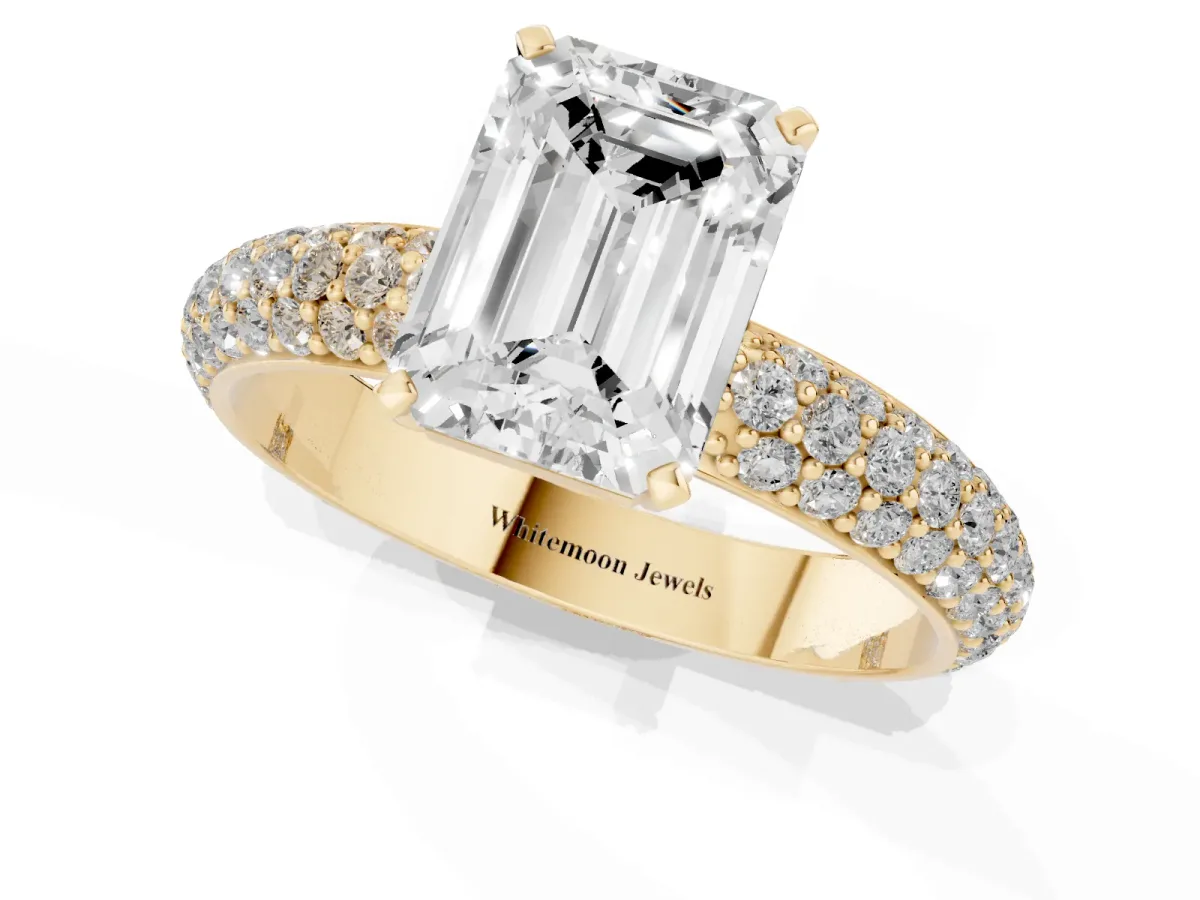 Emerald Cut Diamond Solitaire Ring with Prong Setting and Pavé Band Yellow gold