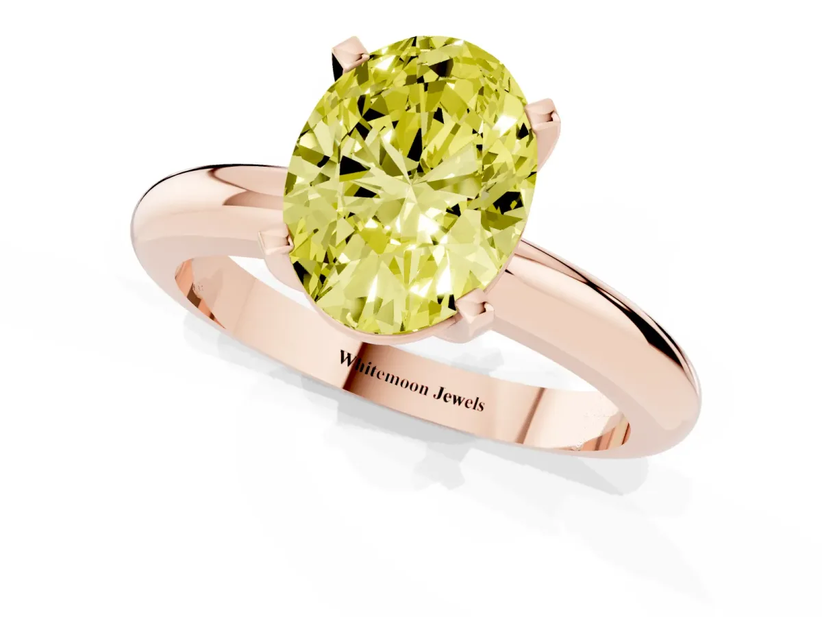 Fancy Yellow Oval Cut Diamond Solitaire Engagement Ring with Round Band and Four-Prong Setting Rose gold