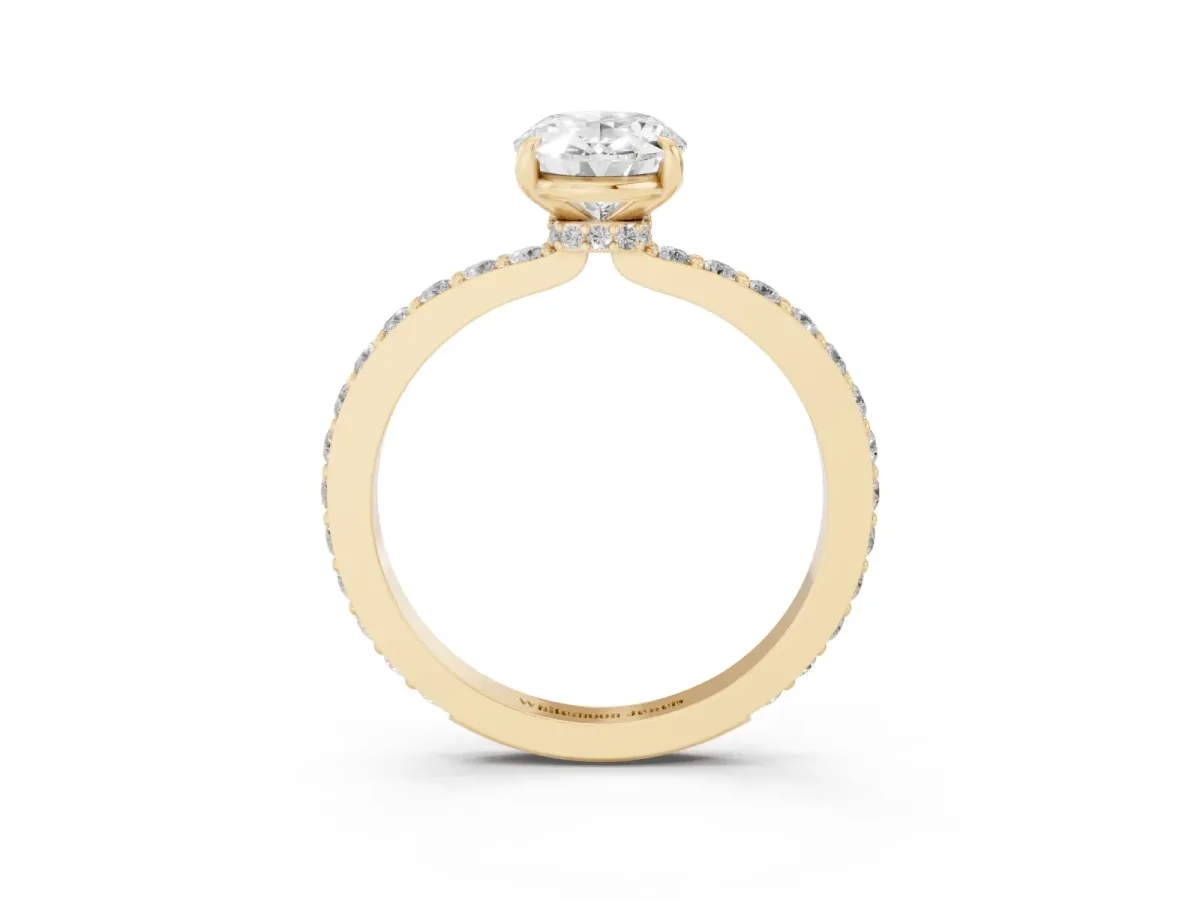 Oval Cut Diamond Pavé Engagement Ring with Round Accents and Prong Setting Yellow gold