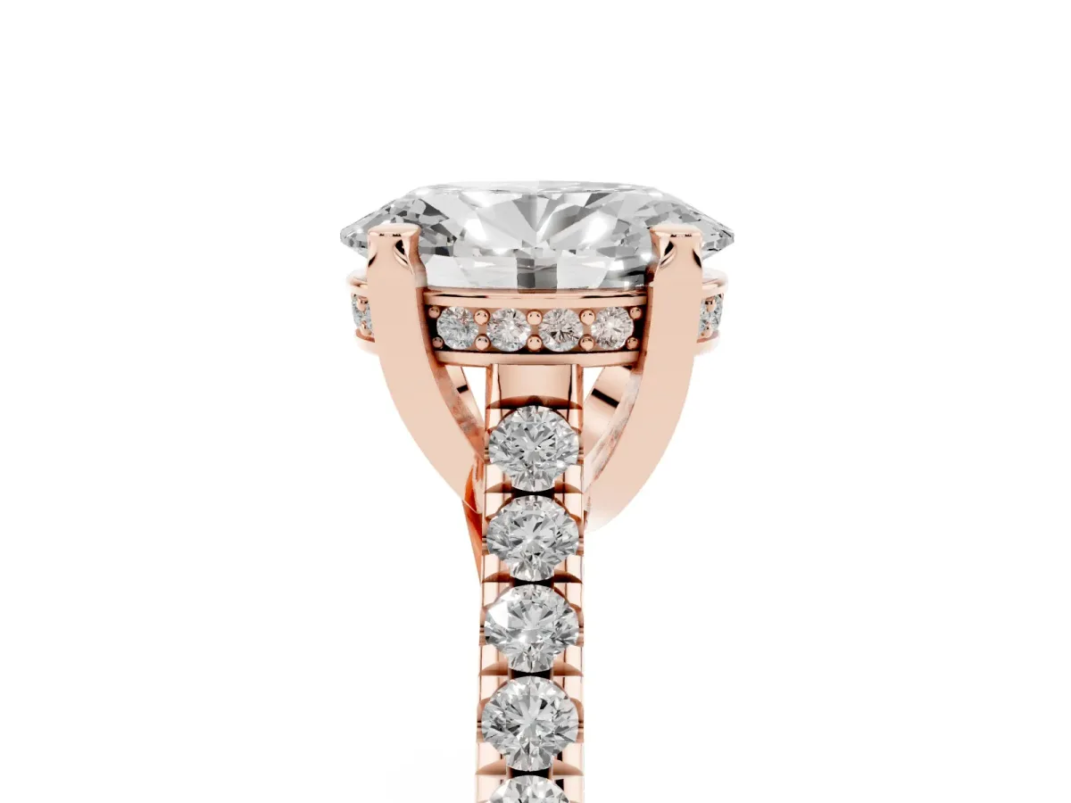 Oval Cut Brilliant Diamond Solitaire with Pavé Band and Four-Prong Setting Rose gold