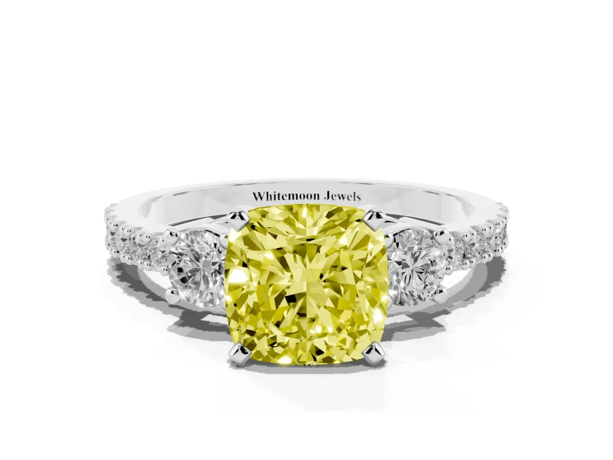 Fancy Yellow Cushion Cut Three-Stone Diamond Pavé Band with Prong Setting Platinum