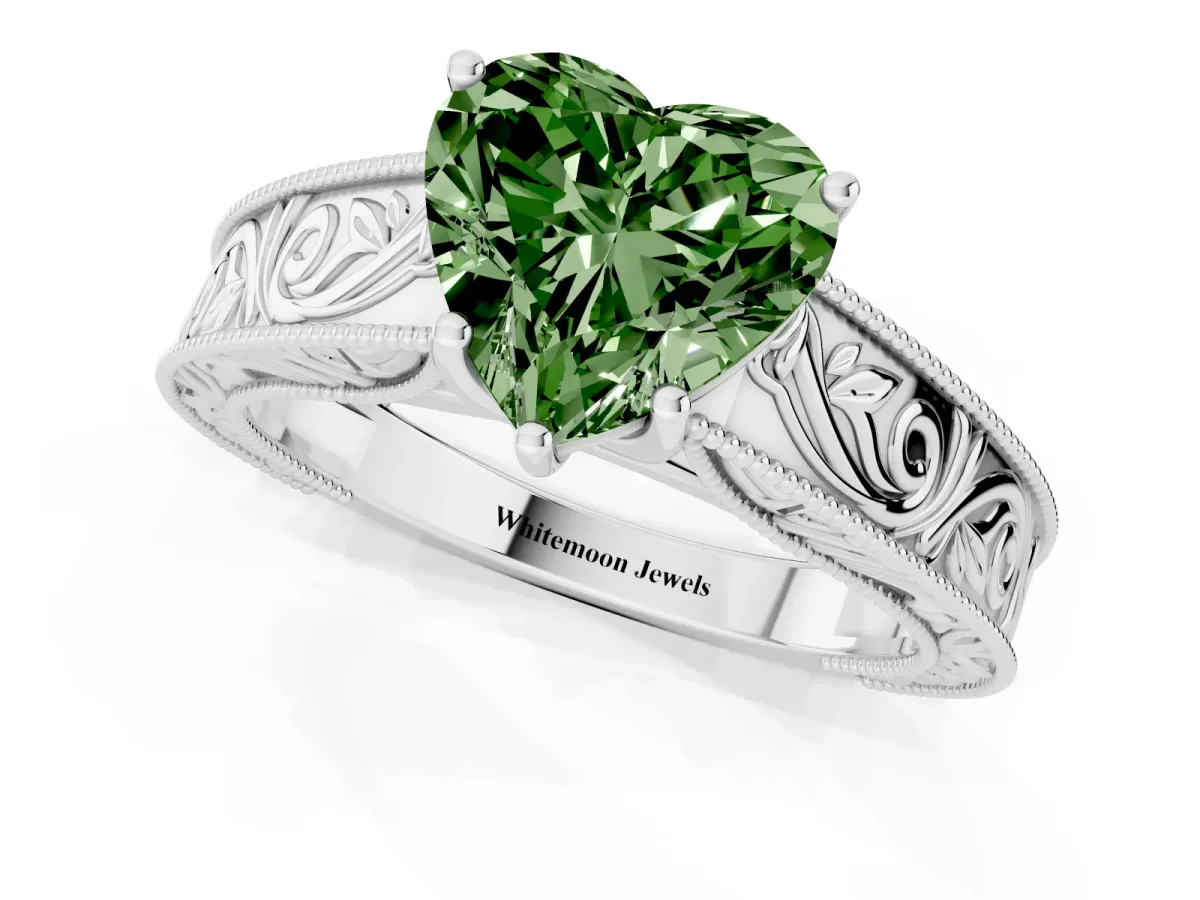 Fancy Green Heart Cut Diamond Solitaire Ring with Engraved Band and Four-Prong Setting Silver