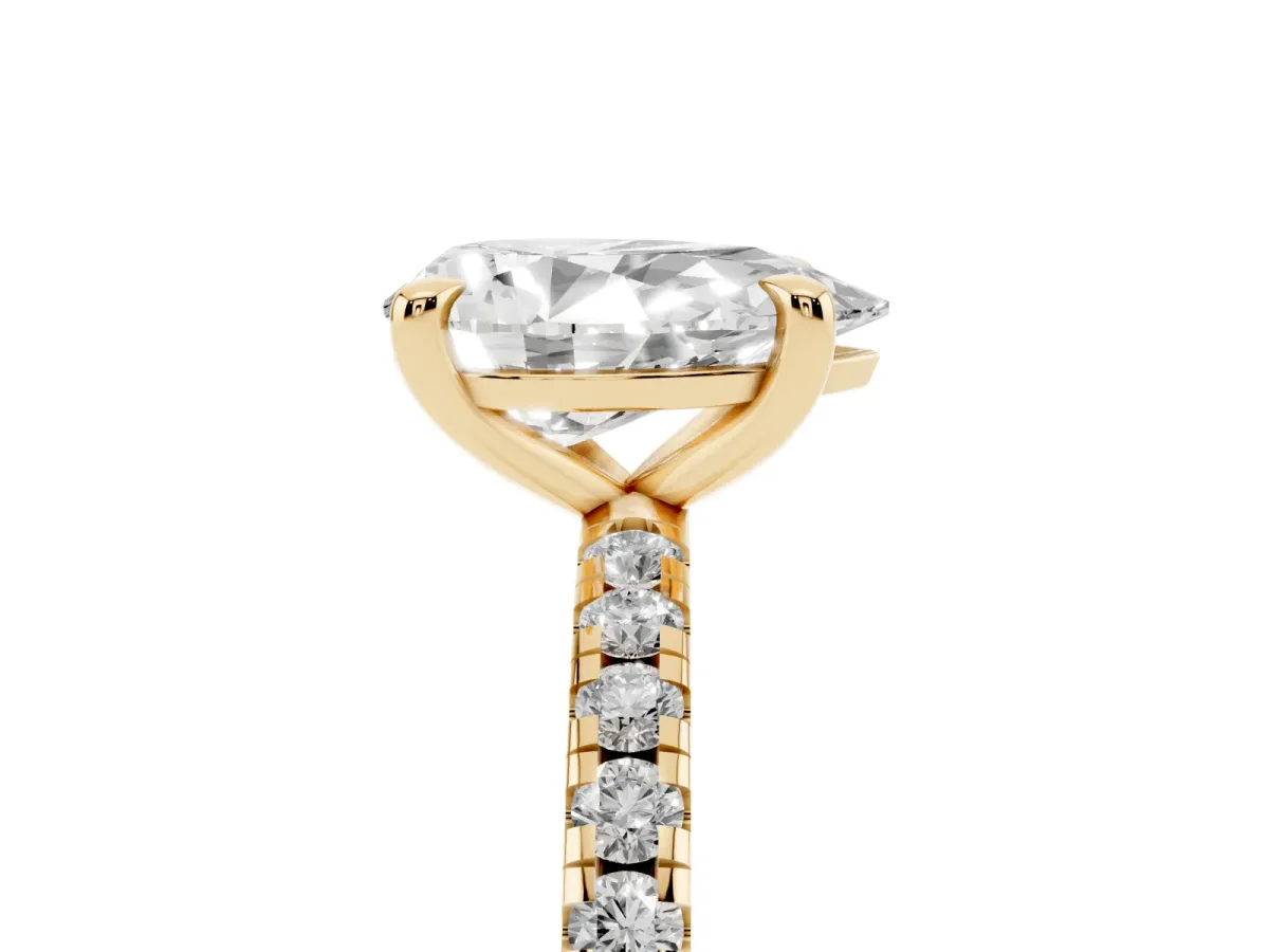 Pear Cut Diamond Brilliant Solitaire Ring with Pavé Band and Four-Prong Setting Yellow gold