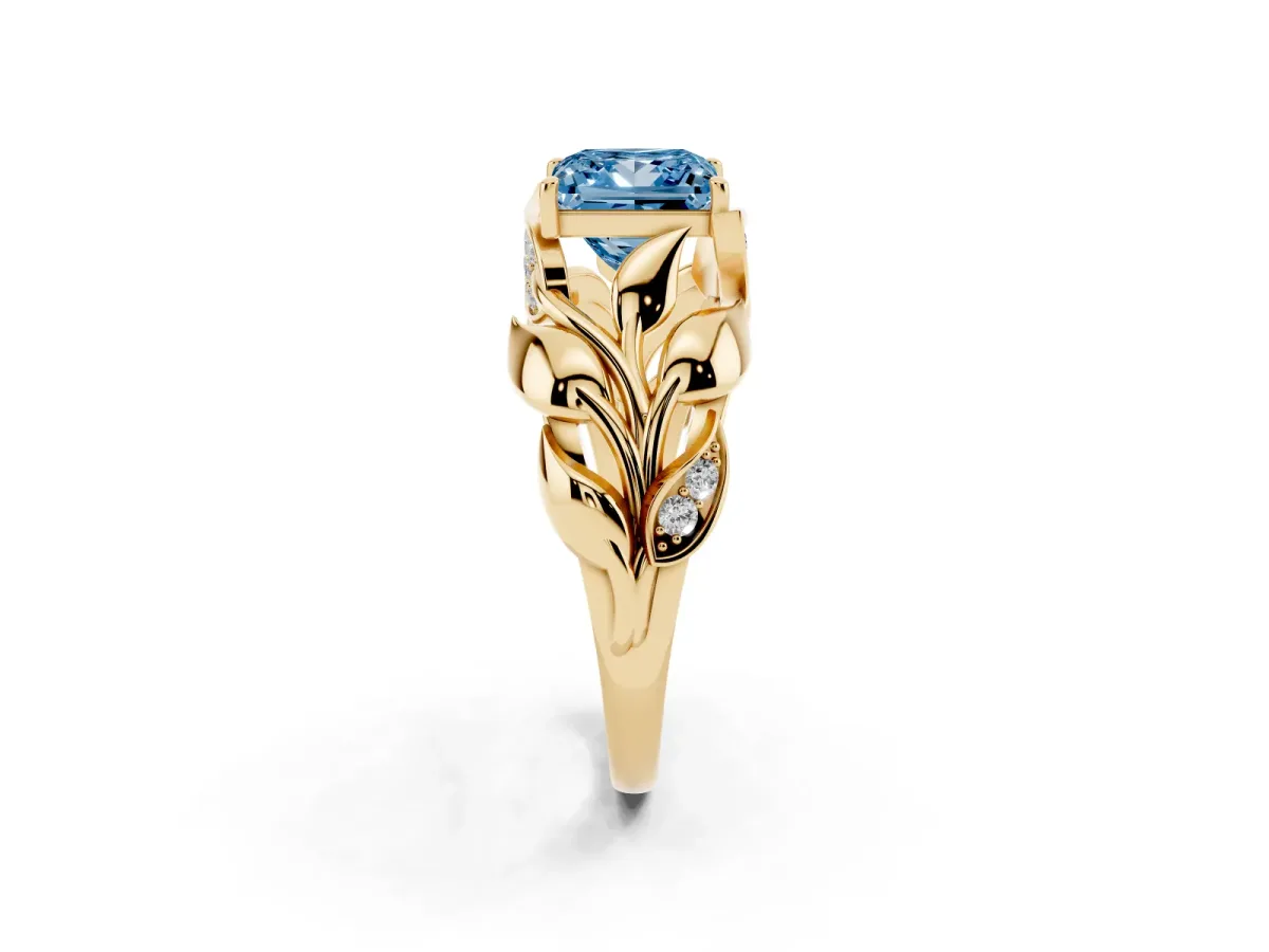 Fancy Blue Princess Cut Diamond Leaf-Inspired Engagement Ring with Round Accents and Prong Setting Yellow gold