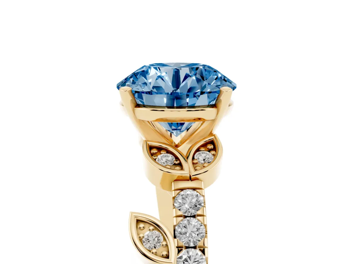 Fancy Blue Round Cut Solitaire Leaf-Inspired Diamond Ring with Pavé Band and Four-Prong Setting Yellow gold