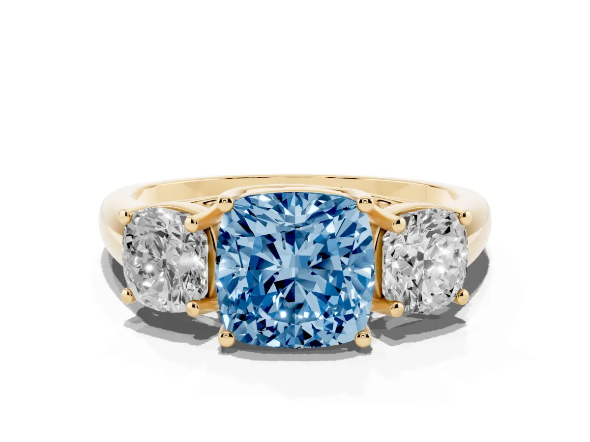 Fancy Blue Three-Stone Cushion Cut Diamond Engagement Ring with Prong Setting Yellow gold