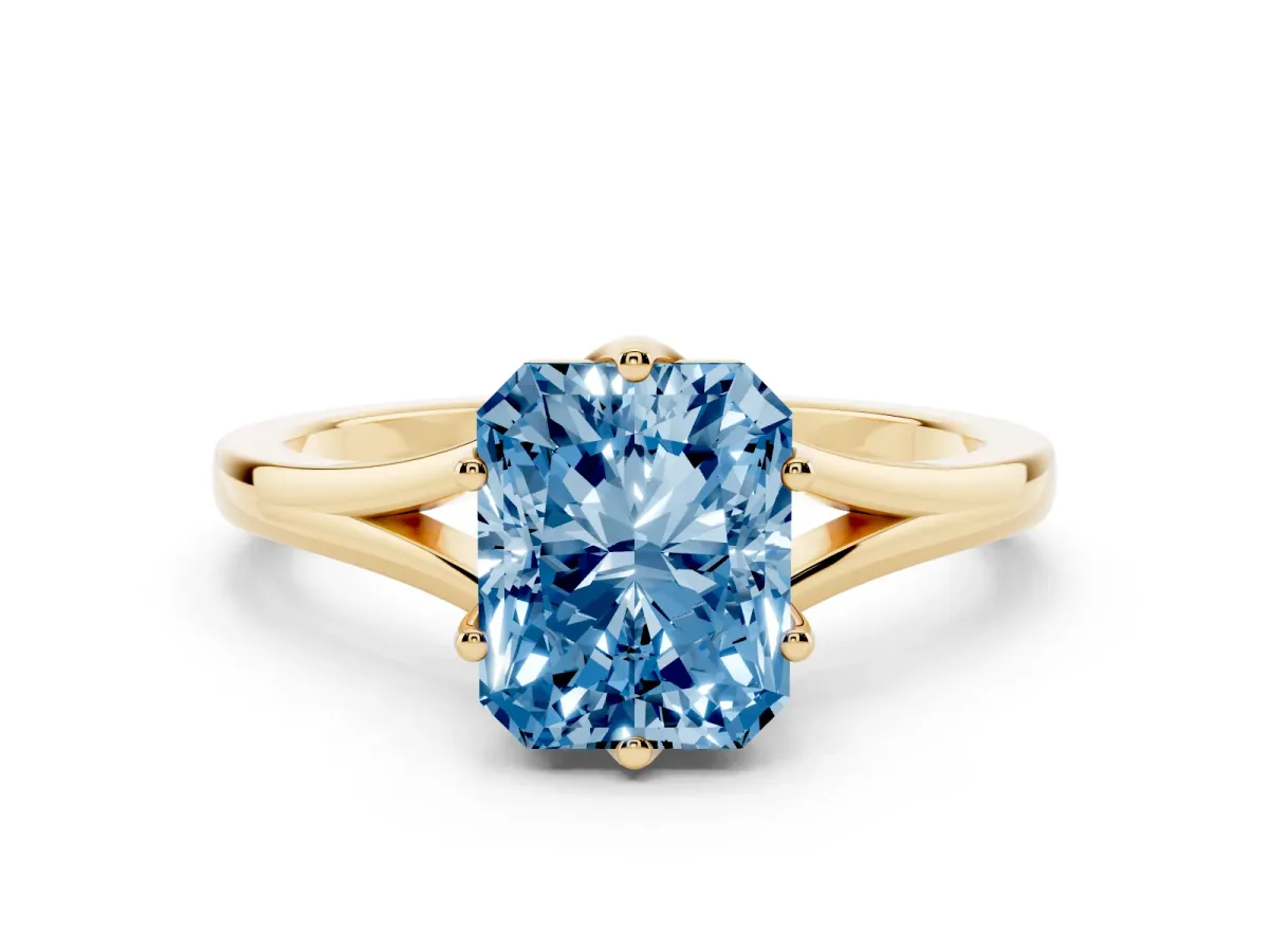 Fancy Blue Radiant Cut Solitaire Diamond Ring with Six-Prong Setting and Tapered Band Yellow gold