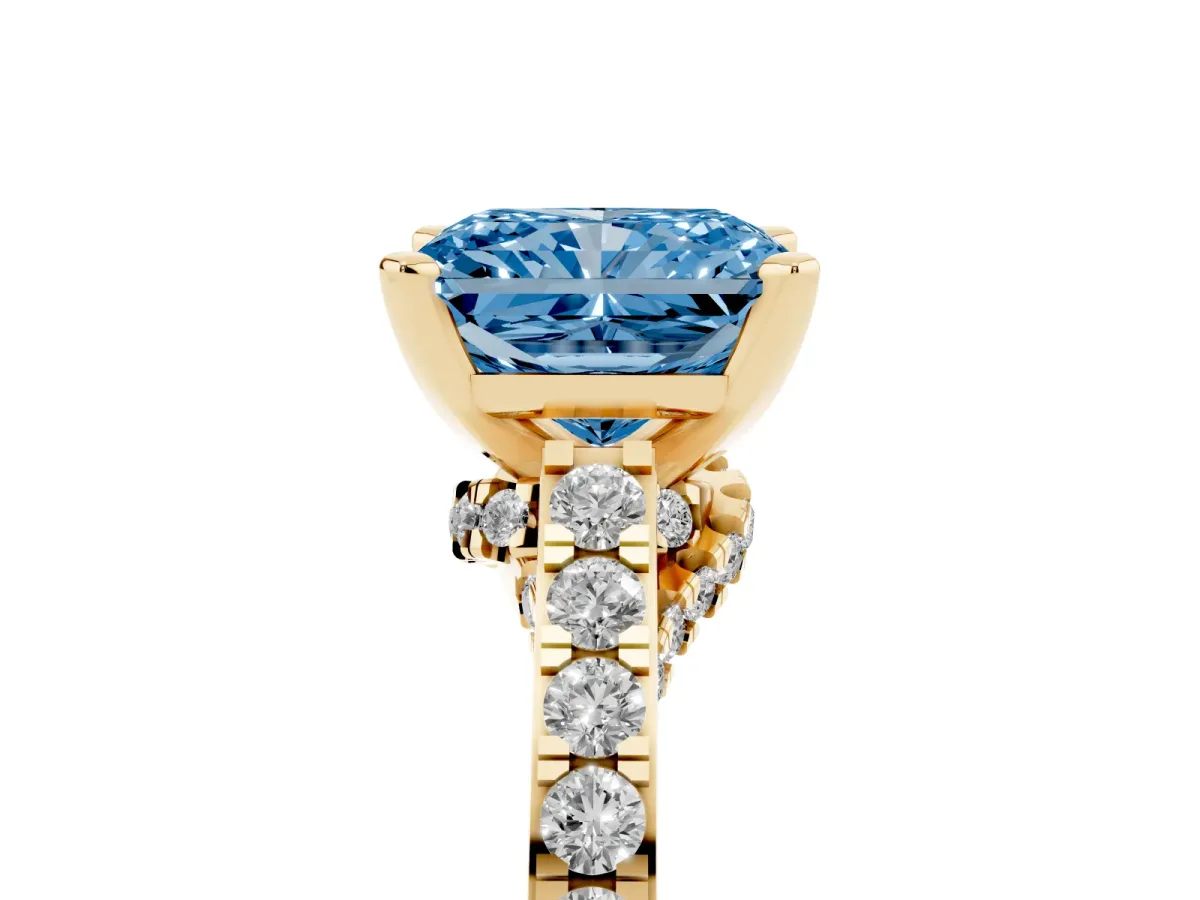 Fancy Blue Radiant Cut Diamond Solitaire Ring with Crossover Gallery and Round Pavé Band Yellow gold