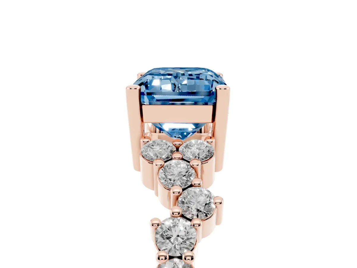 Fancy Blue Emerald Cut Diamond Scattered Round Accent Ring with Prong Setting Rose gold