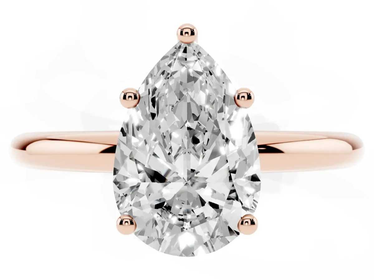 Pear Cut Cut Solitaire Engagement Ring with Four-Prong Setting and Classic Band Rose gold