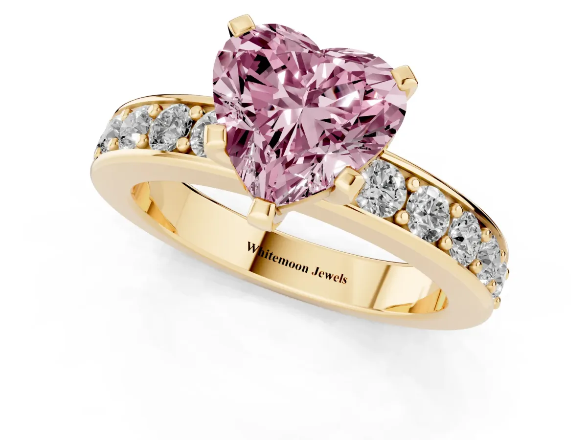Fancy Pink Heart Cut Diamond Engagement Ring with Channel Set Round Band and Prong Setting Yellow gold