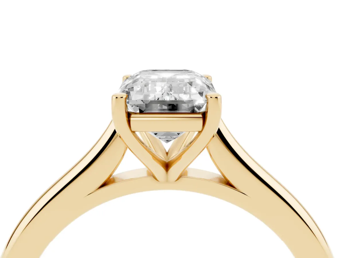 Emerald Cut Cut Solitaire Ring with Cathedral Band and Four-Prong Setting Yellow gold