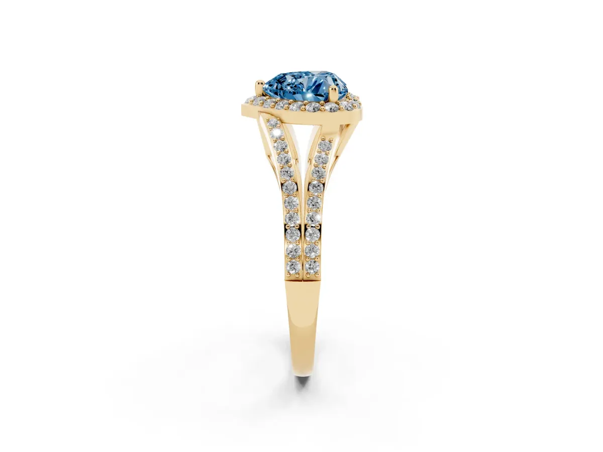Fancy Blue Heart Cut Halo Split Shank Pave Diamond Ring with Four-Prong Setting Yellow gold