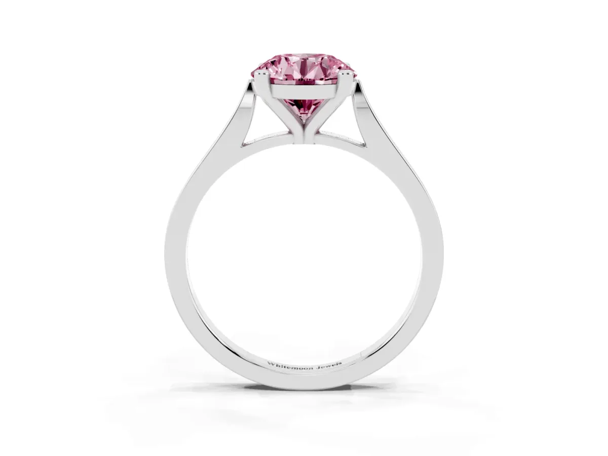 Fancy Pink Round Cut Solitaire Diamond Ring with Four-Prong Setting and Tapered Band Platinum