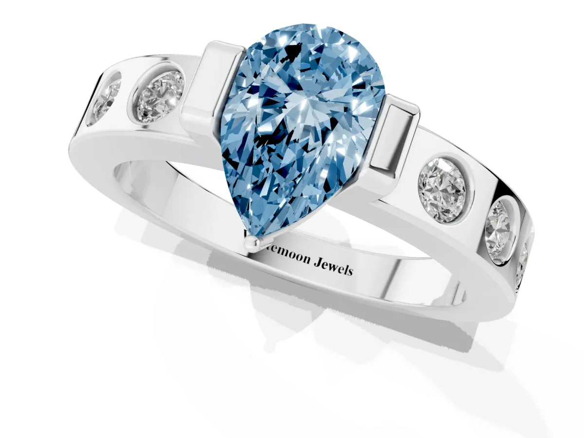 Fancy Blue Pear Cut Brilliant Channel-Set Diamond Ring with Bezel Prong Setting Silver