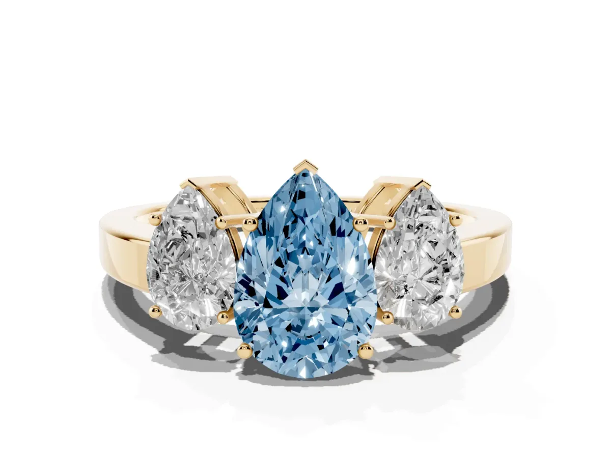 Fancy Blue Three-Stone Pear Cut Cut Diamond Engagement Ring with Flat Band and Four-Prong Setting Yellow gold