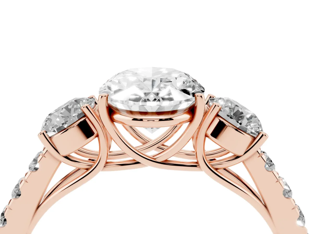 Oval Cut Cut Diamond Three-Stone Ring with Round Side Stones and Pavé Band Rose gold