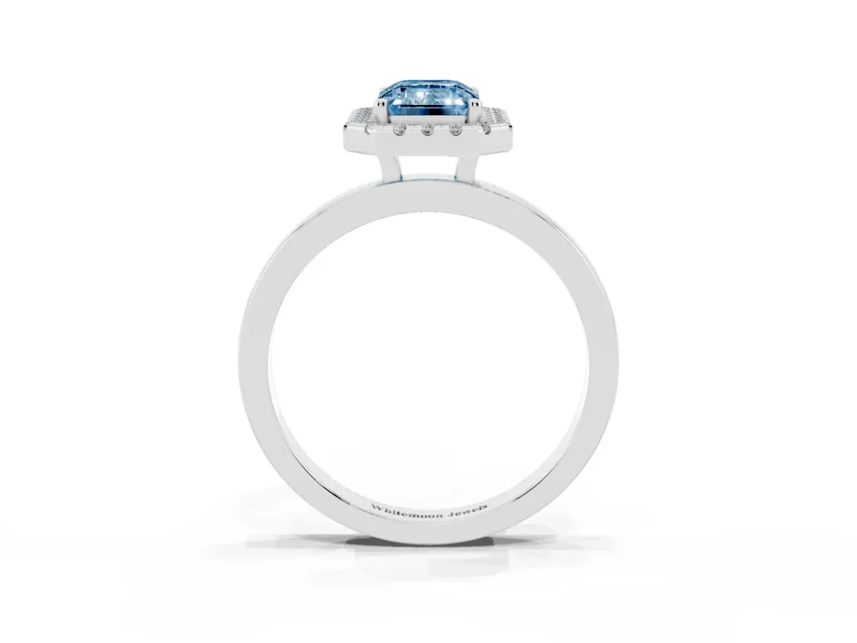 Fancy Blue Emerald Cut Halo Diamond Solitaire with Pavé Band and Four-Prong Setting White gold