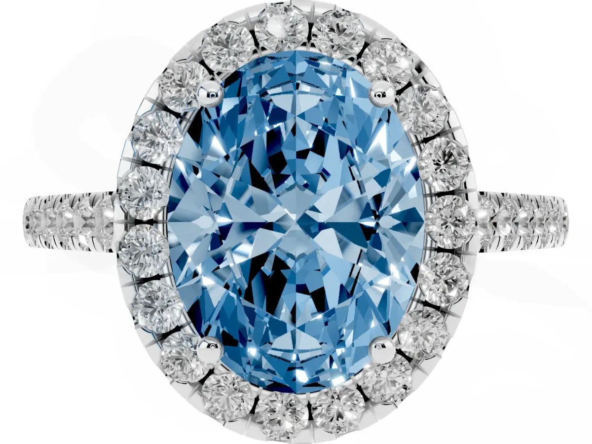 Fancy Blue Oval Cut Halo Pave Diamond Engagement Ring with Four-Prong Setting Silver