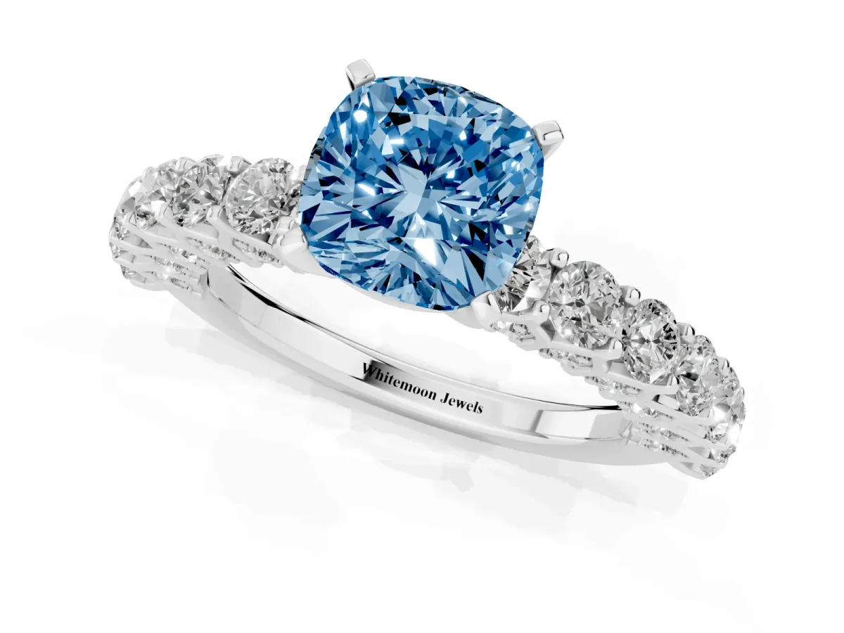 Fancy Blue Cushion Cut Diamond Solitaire Ring with Shared Prong Pavé Band and Four-Prong Setting Silver