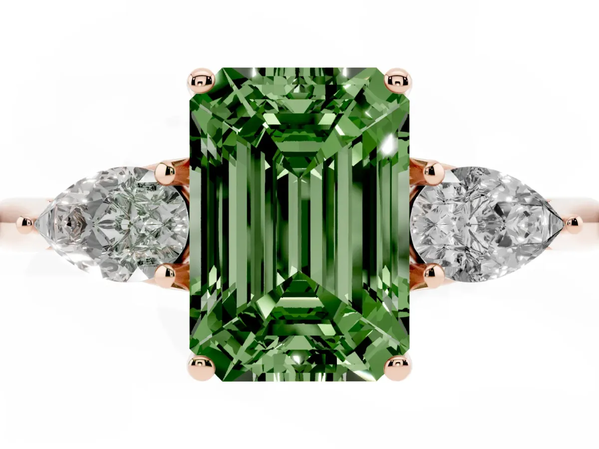 Fancy Green Three-Stone Emerald Cut Diamond Ring with Pear Side Stones in Four-Prong Setting Rose gold