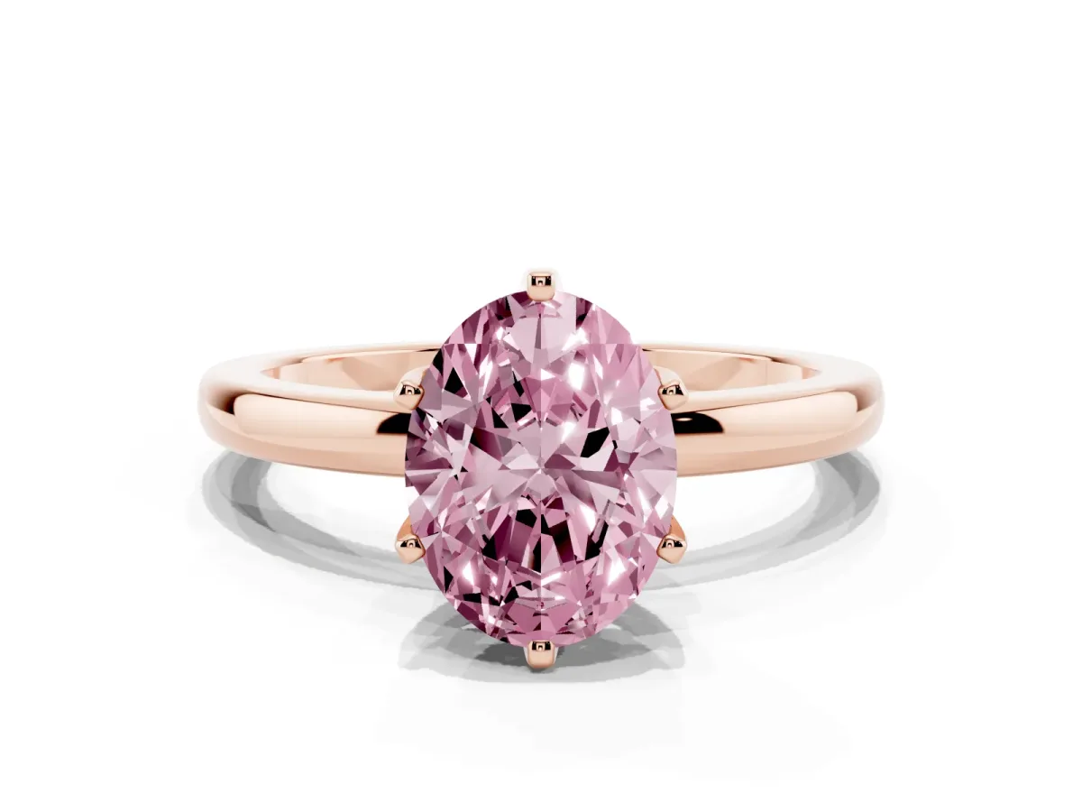 Fancy Pink Oval Cut Solitaire Diamond Ring with Six-Prong Setting on a Classic Band Rose gold