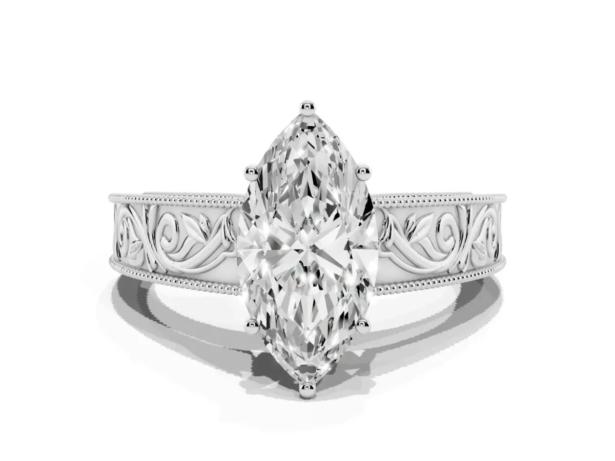 Marquise Cut Diamond Solitaire Ring with Engraved Band and Four-Prong Setting Silver