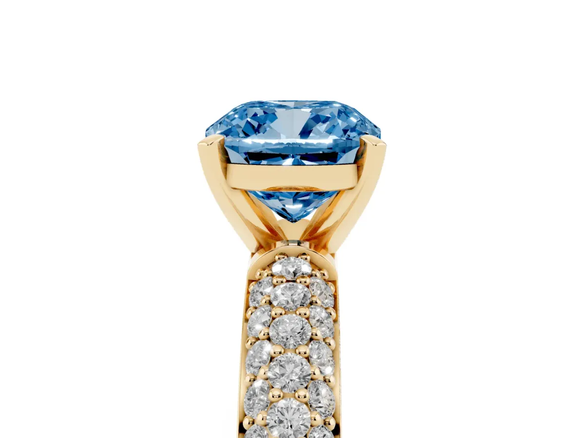Fancy Blue Cushion Cut Diamond Solitaire Ring with Prong Setting and Pavé Band Yellow gold