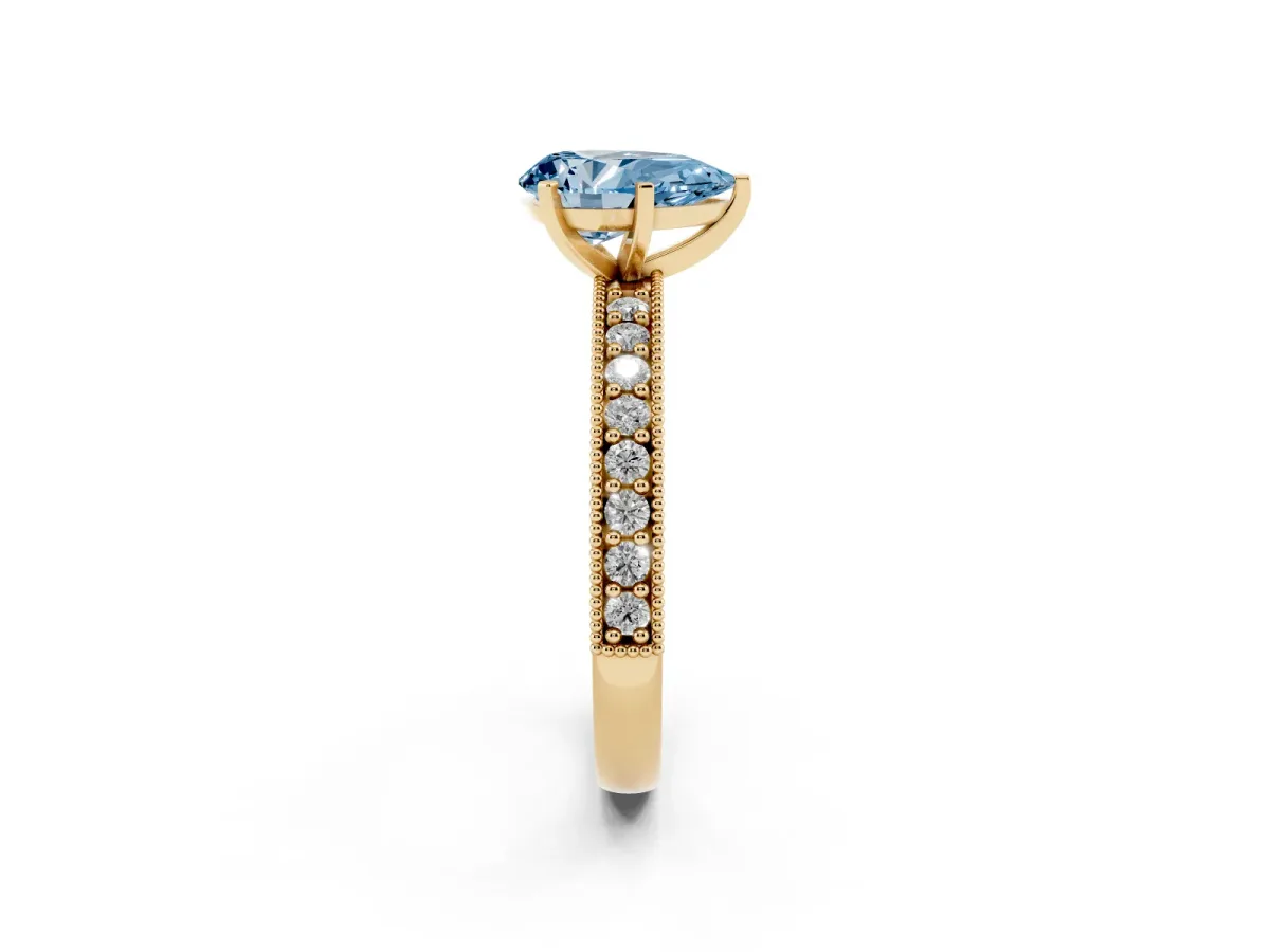 Fancy Blue Pear Cut Diamond Milgrain Pavé Engagement Ring with Four-Prong Setting Yellow gold