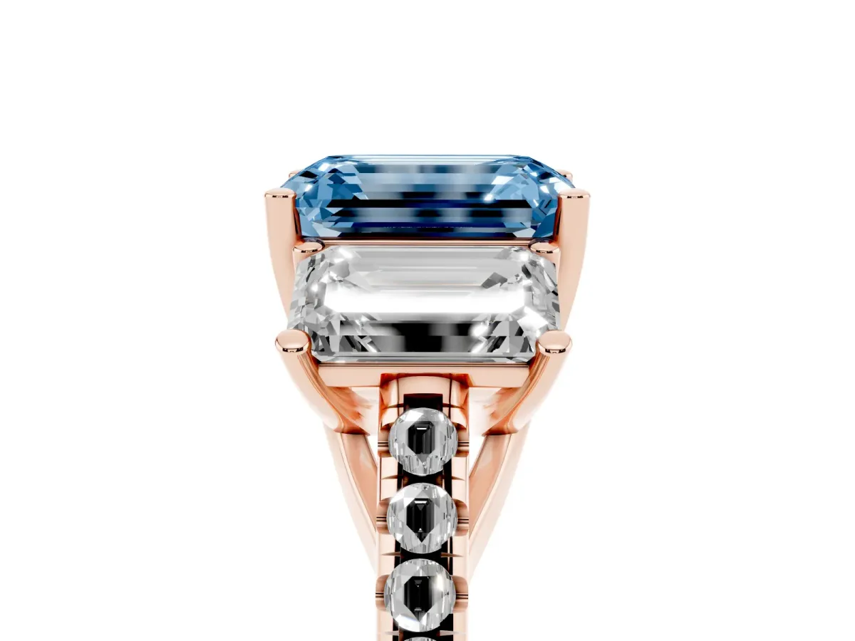 Fancy Blue Three-Stone Emerald Cut Diamond Ring with Round Pavé Band and Prong Setting Rose gold