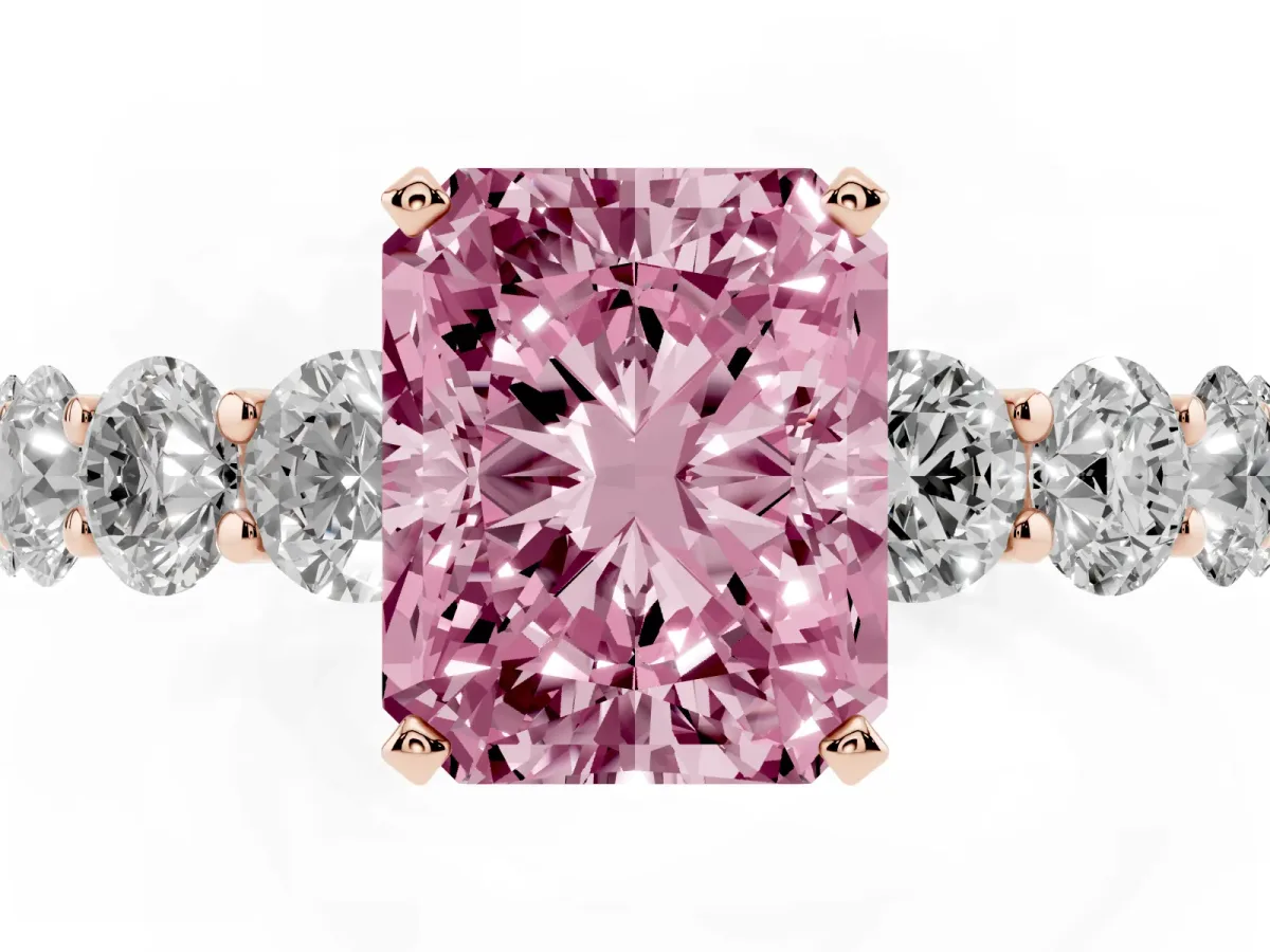 Fancy Pink Radiant Cut Diamond Prong Setting with Side Stones on a Pave Band Rose gold