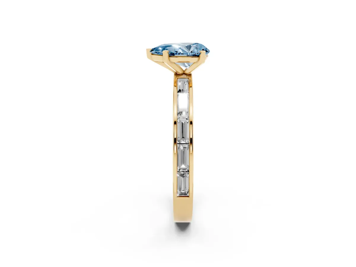 Fancy Blue Pear Cut Solitaire Diamond Ring with Channel-Set Baguette Band and Four-Prong Setting Yellow gold