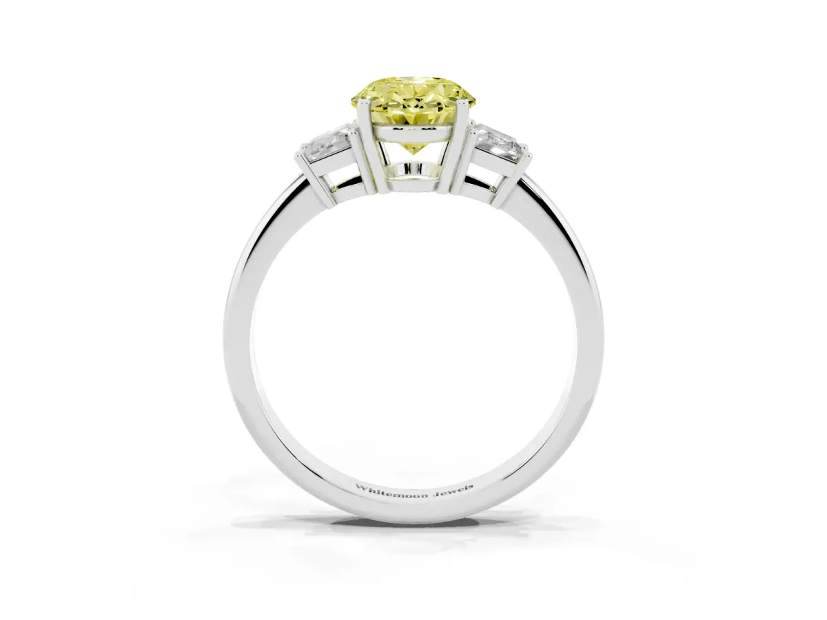 Fancy Yellow Oval Cut Diamond Three-Stone Ring with Trapezoid Side Stones and Prong Setting Platinum