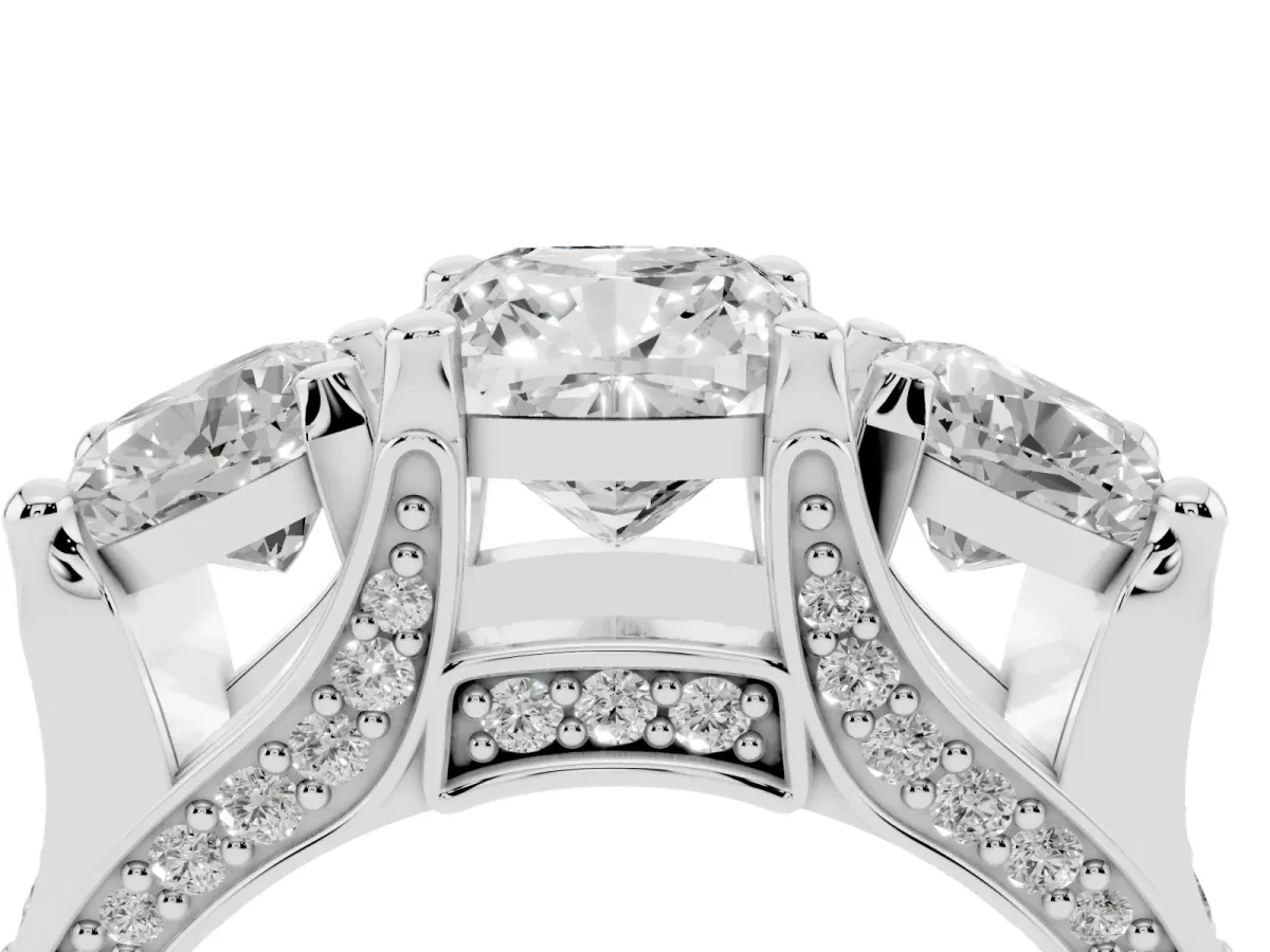 Cushion Cut Diamond Three-Stone Ring with Channel Set Band and Four-Prong Setting Silver