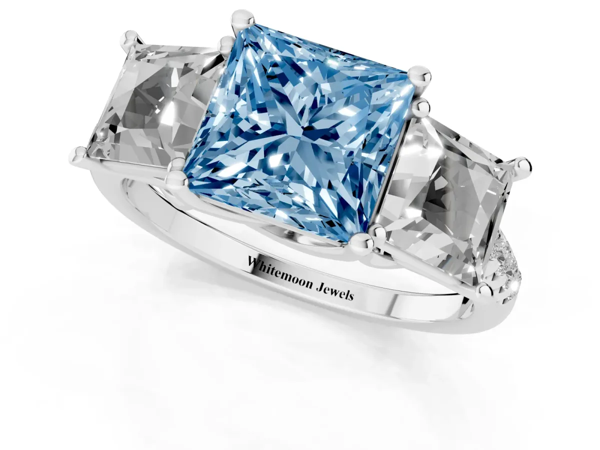 Fancy Blue Three-Stone Princess Cut Diamond Ring with Round Pavé Band and Prong Setting Silver