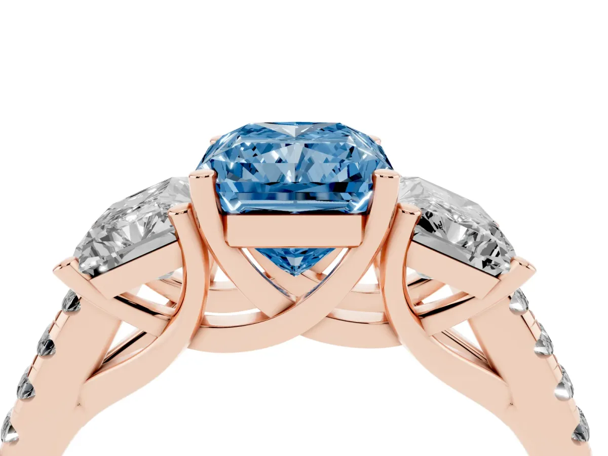 Fancy Blue Three-Stone Radiant Cut Diamond Ring with Round Pavé Band and Prong Setting Rose gold