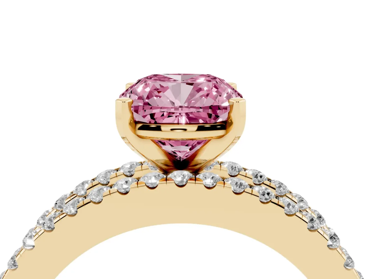 Fancy Pink Cushion Cut Diamond Solitaire Ring with Pavé and Channel Set Band Yellow gold