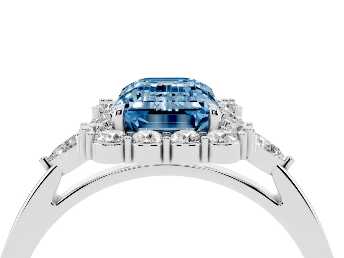 Fancy Blue Emerald Cut Diamond Halo Ring with Pear Side Stones and Prong Setting Platinum