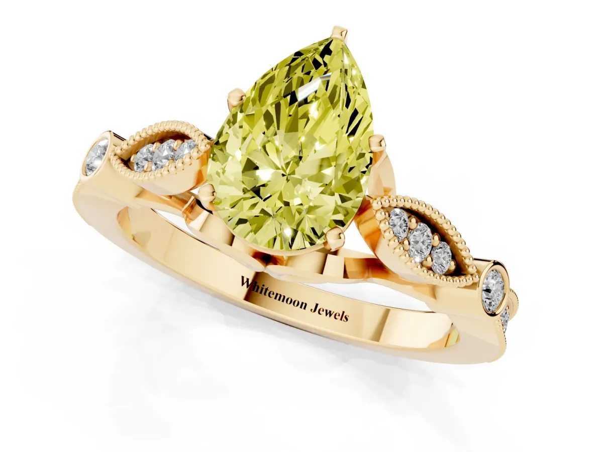 Fancy Yellow Pear Cut Cut Diamond with Milgrain Marquise and Bezel Accents on a Solitaire Band with Prong Setting Yellow gold