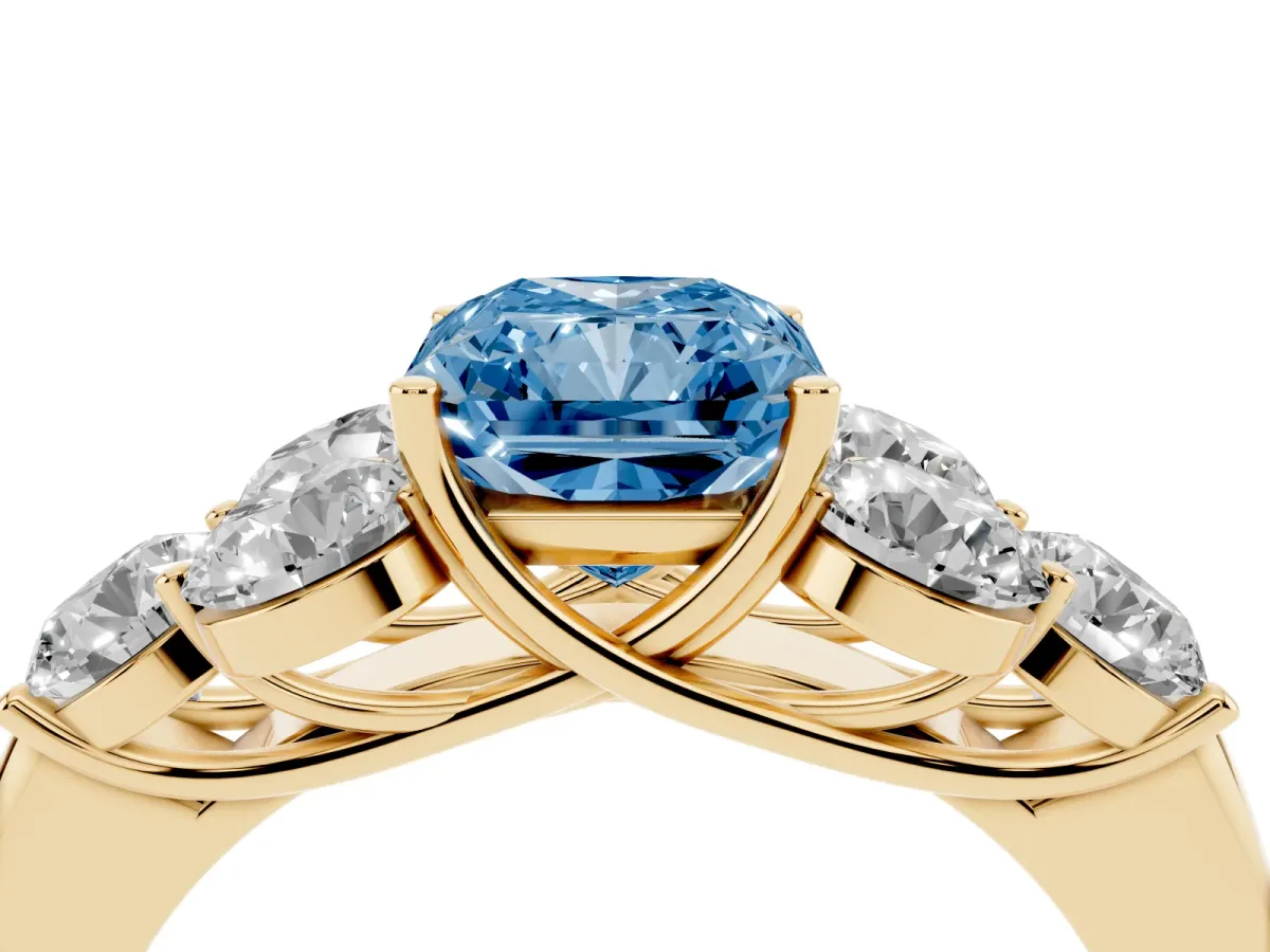Fancy Blue Radiant Cut Cut Diamond Cluster Ring with Round Accent Stones and Prong Setting on a Classic Band Yellow gold