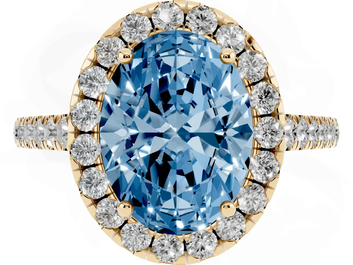 Fancy Blue Oval Cut Halo Pave Diamond Engagement Ring with Four-Prong Setting Yellow gold