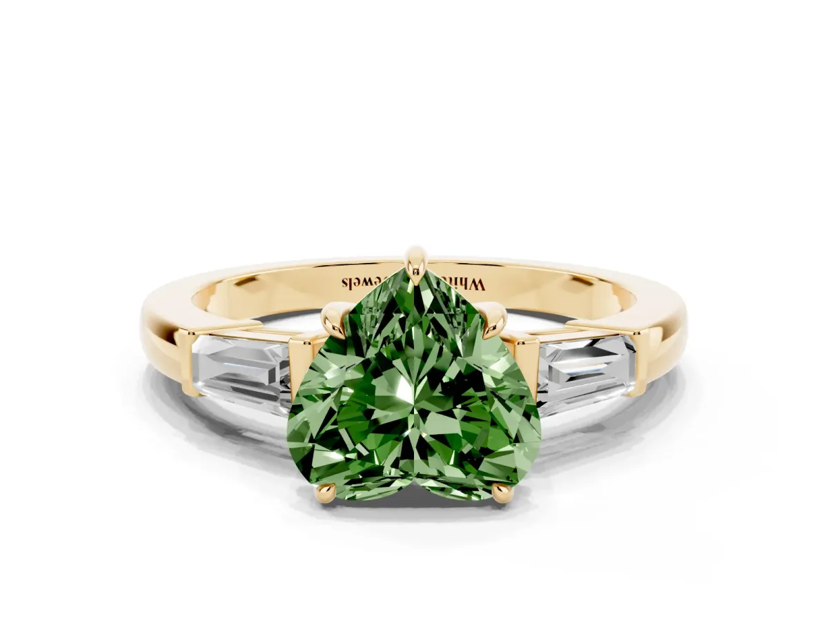 Fancy Green Heart Cut Diamond Three-Stone Ring with Tapered Baguette Side Stones and Prong Setting Yellow gold
