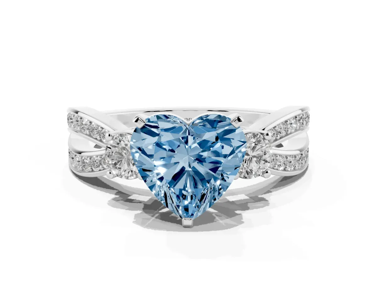 Fancy Blue Three-Stone Heart Cut Cut Diamond Twist Band with Prong Setting Silver